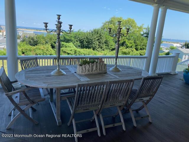 52 Navesink Avenue Highlands, NJ 07732 - Photo 24 of 71 a view of balcony with furniture and wooden deck