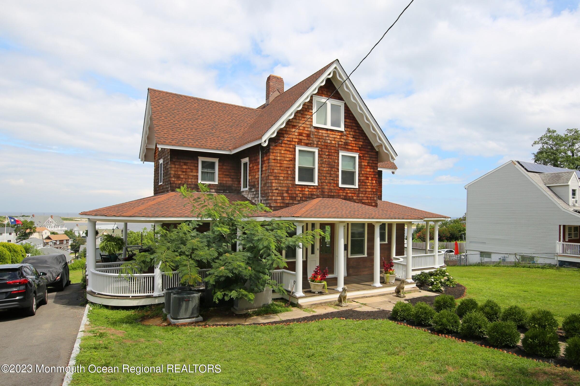 52 Navesink Avenue Highlands, NJ 07732 - Photo 32 of 71 a front view of a house with a yard