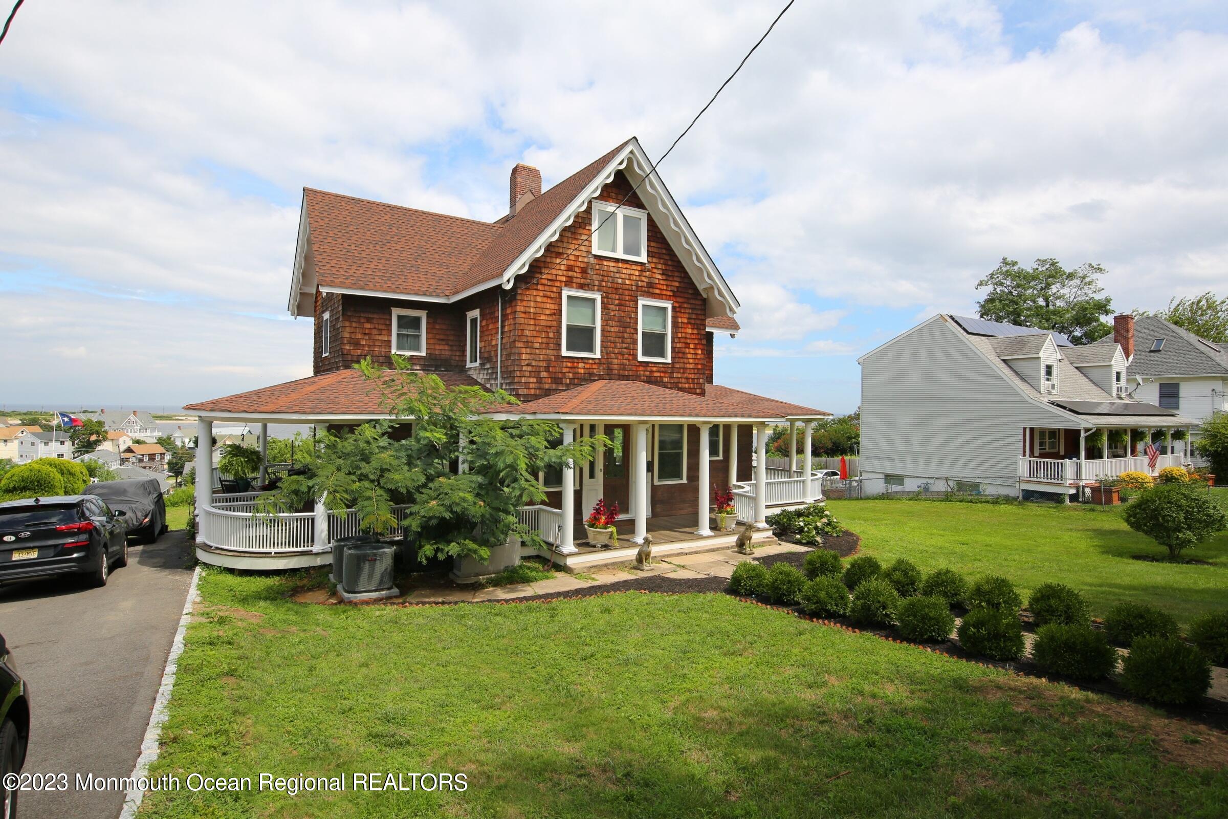 52 Navesink Avenue Highlands, NJ 07732 - Photo 33 of 71 a front view of a house with a yard