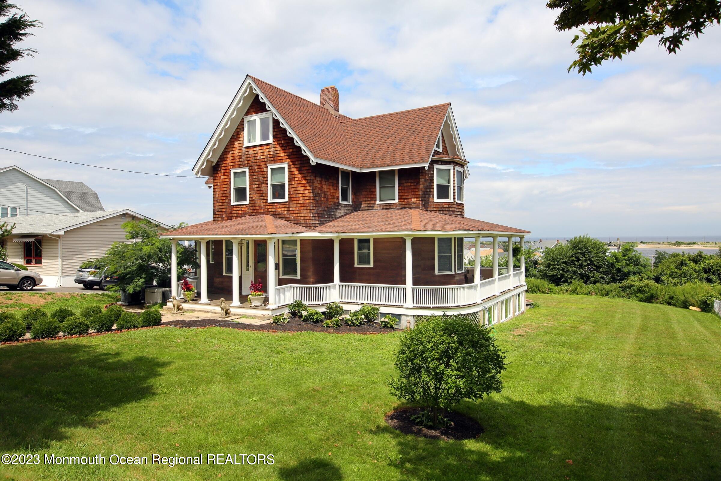 52 Navesink Avenue Highlands, NJ 07732 - Photo 35 of 71 a front view of a house with garden