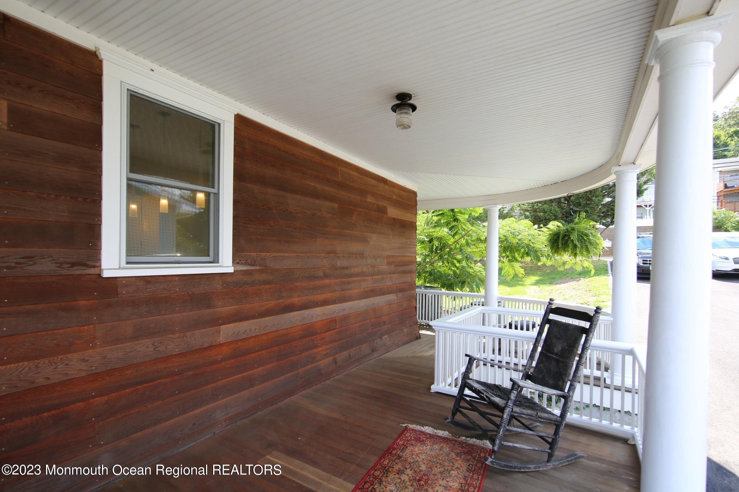 52 Navesink Avenue Highlands, NJ 07732 - Photo 44 of 71 a view of a two chair in the balcony