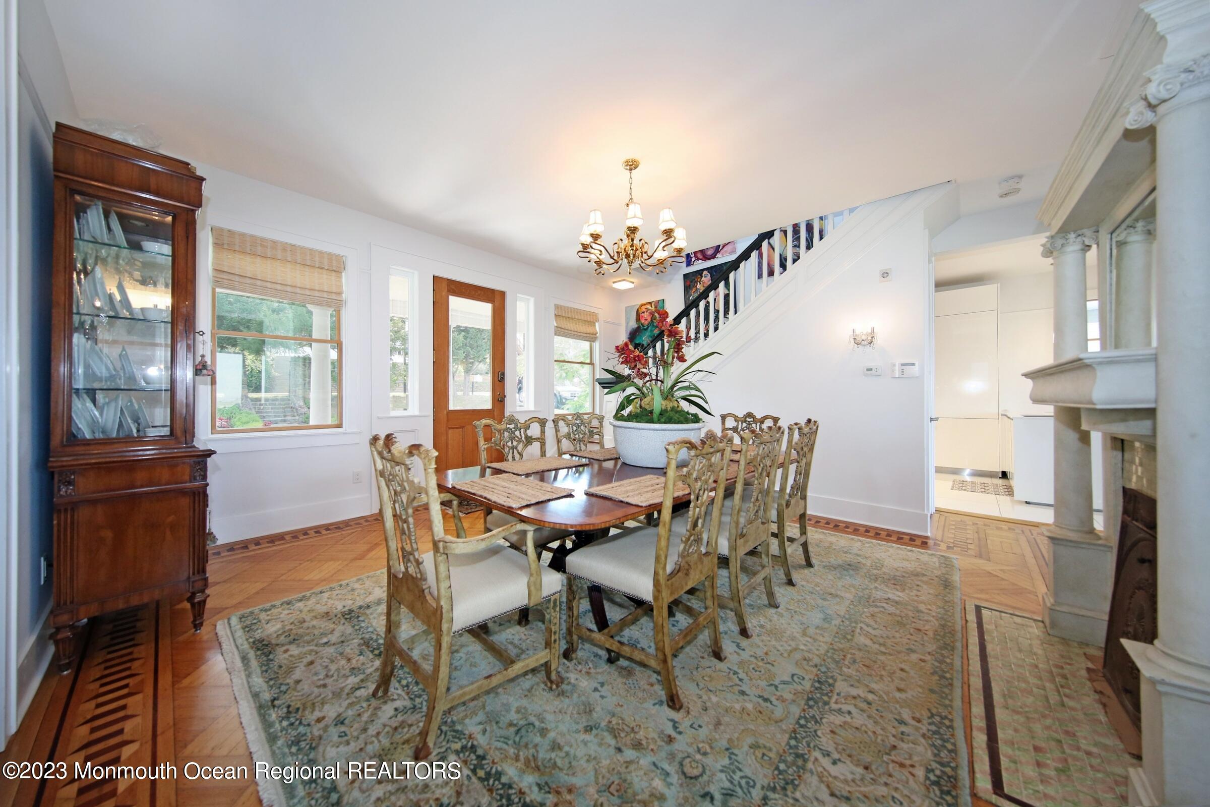 52 Navesink Avenue Highlands, NJ 07732 - Photo 5 of 71 a view of a dining room with furniture window and wooden floor