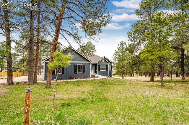 711 Pine Ridge Street Elizabeth, CO 80107 - Photo 7 of 39 View of front of home with a front lawn
