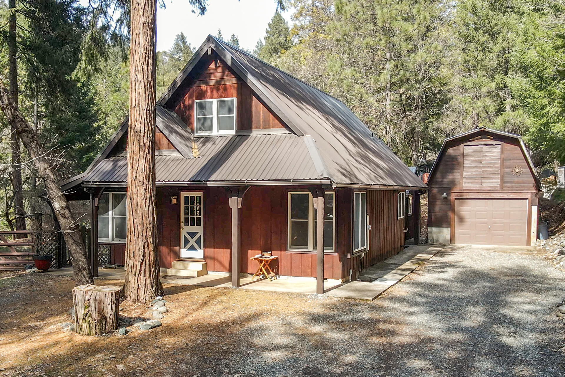 491 East Branch Road Weaverville, CA 96093 - Photo 2 of 59 a front view of a house with a porch