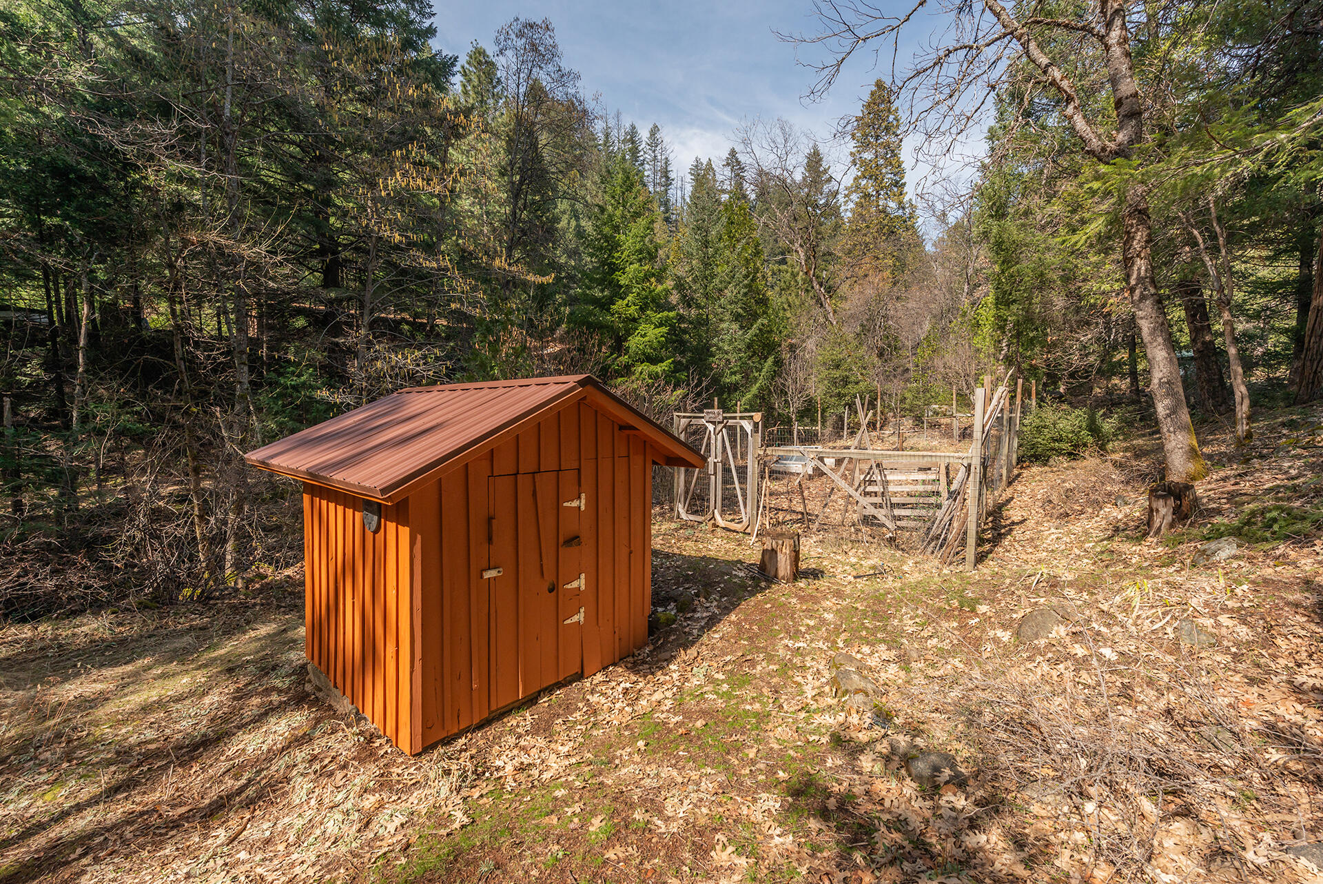 491 East Branch Road Weaverville, CA 96093 - Photo 22 of 59 a view of a house with a yard and wooden fence