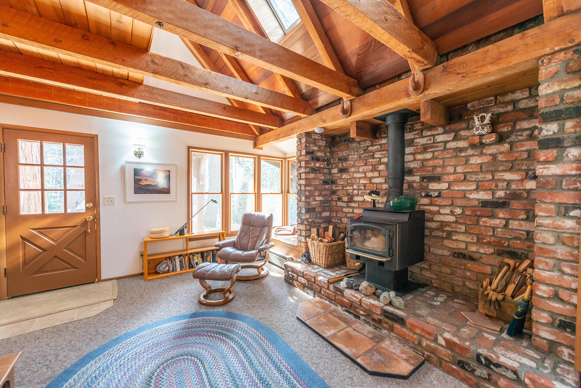 491 East Branch Road Weaverville, CA 96093 - Photo 27 of 59 a living room with furniture a fireplace and city view