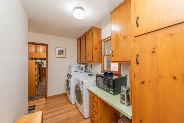 a reading room with furniture and a window
