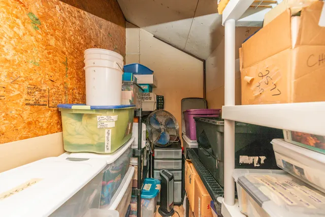 a view of an empty room with stairs