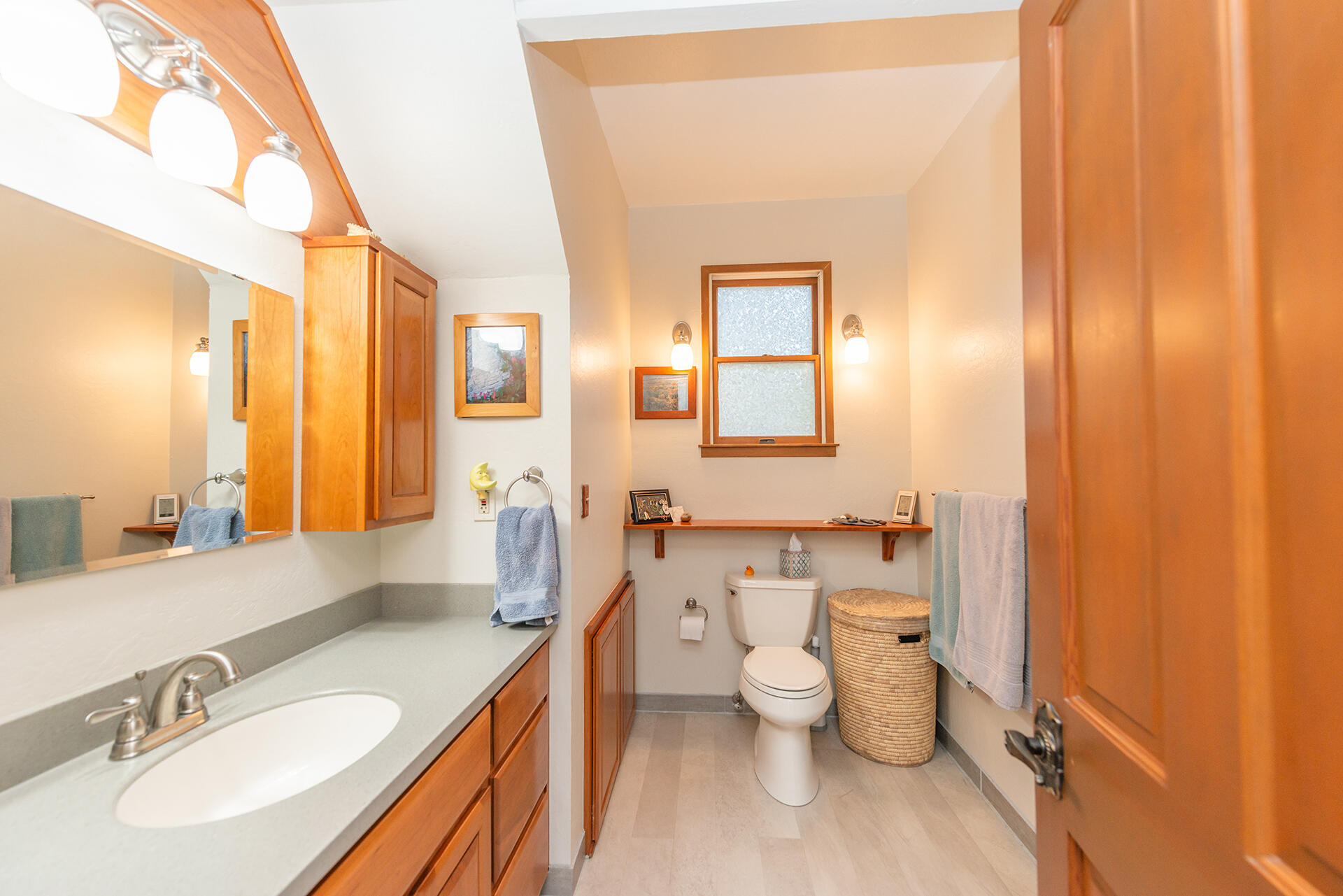 491 East Branch Road Weaverville, CA 96093 - Photo 56 of 59 a bathroom with a granite countertop sink mirror vanity and toilet
