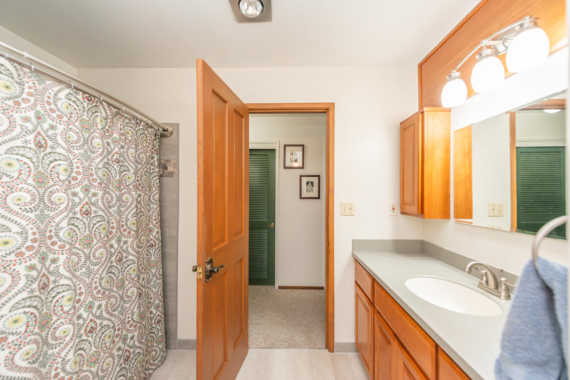 491 East Branch Road Weaverville, CA 96093 - Photo 57 of 59 a bathroom with a granite countertop sink a mirror and a shower