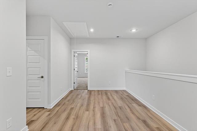2562 Harbor Ridge Pass Gainesville, GA 30507 - Photo 12 of 27 a view of room with closet and wooden floor