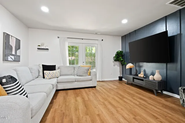 a picture of a bench in front of a wall