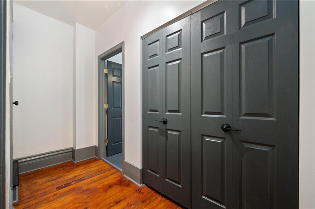 162 Almond Way Pittsburgh, PA 15201 - Photo 16 of 38 a view of a livingroom with an empty space and wooden floor