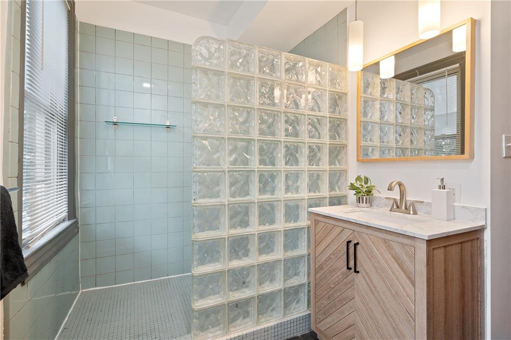 162 Almond Way Pittsburgh, PA 15201 - Photo 18 of 38 a bathroom with a sink a toilet and a shower