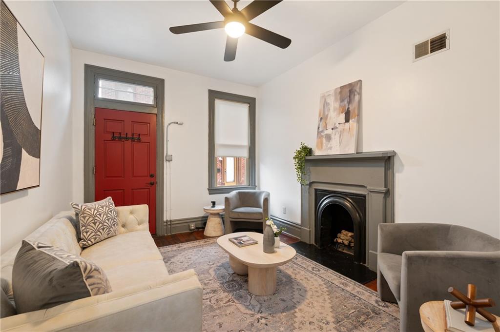 162 Almond Way Pittsburgh, PA 15201 - Photo 2 of 38 a living room with furniture and a fireplace