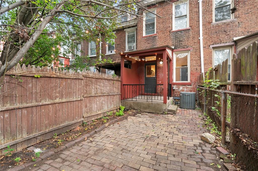 162 Almond Way Pittsburgh, PA 15201 - Photo 28 of 38 a view of a brick house with many windows
