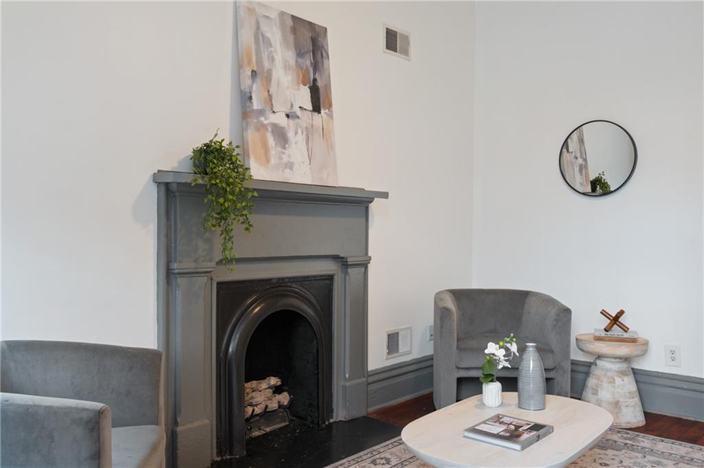 162 Almond Way Pittsburgh, PA 15201 - Photo 4 of 38 a living room with furniture and a fireplace