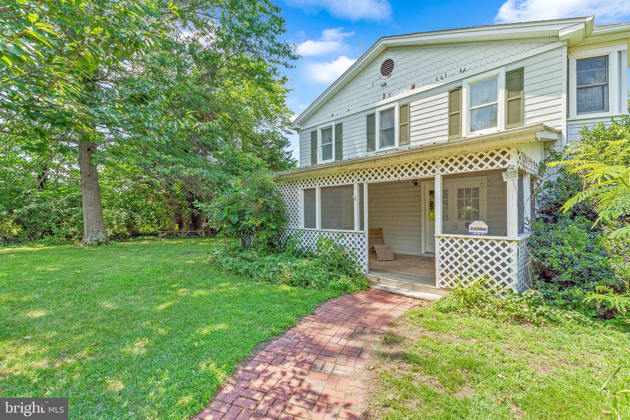 2440 Hallowing Point Road Prince Frederick, MD 20678 - Photo 28 of 51 a front view of a house with garden