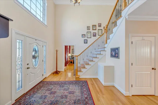 a view of staircase with rug