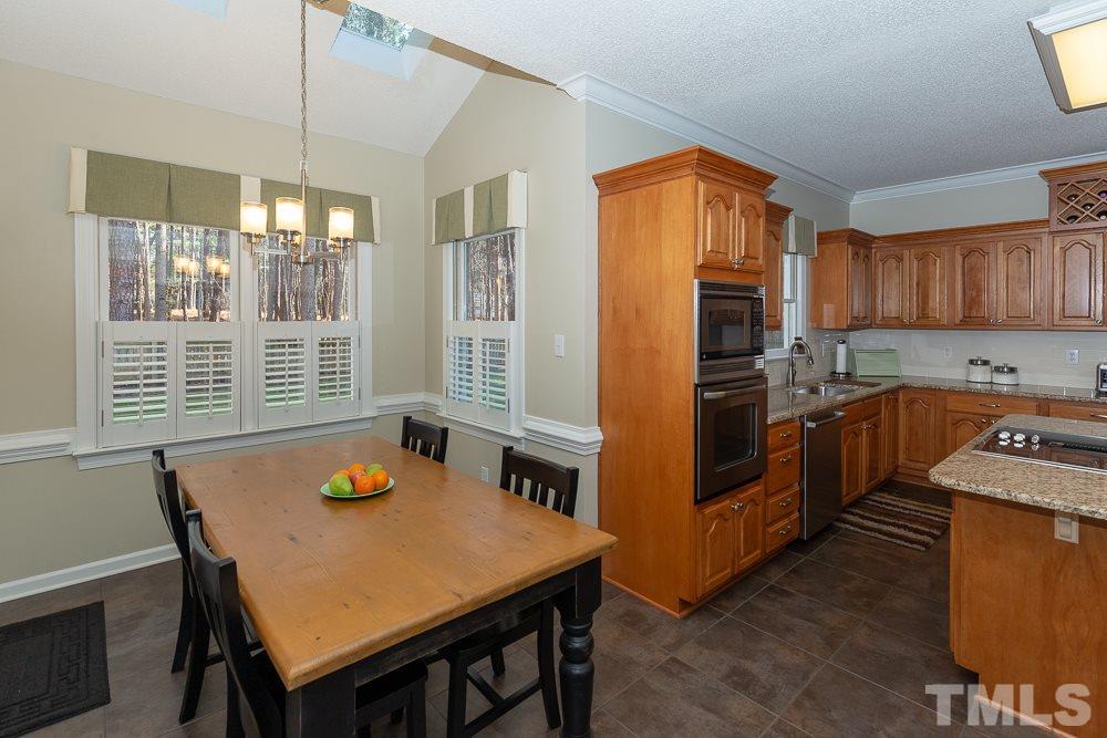 12016 Warwickshire Way Raleigh, NC 27613 - Photo 6 of 25 Gallery Image 6
