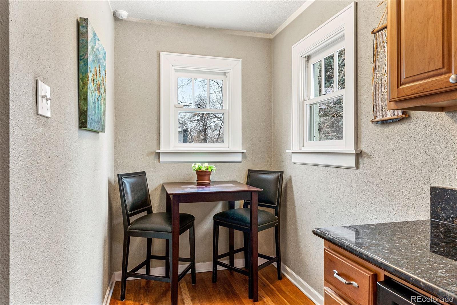 1639 Grape Street Denver, CO 80220 - Photo 14 of 39 a dining room with furniture and window