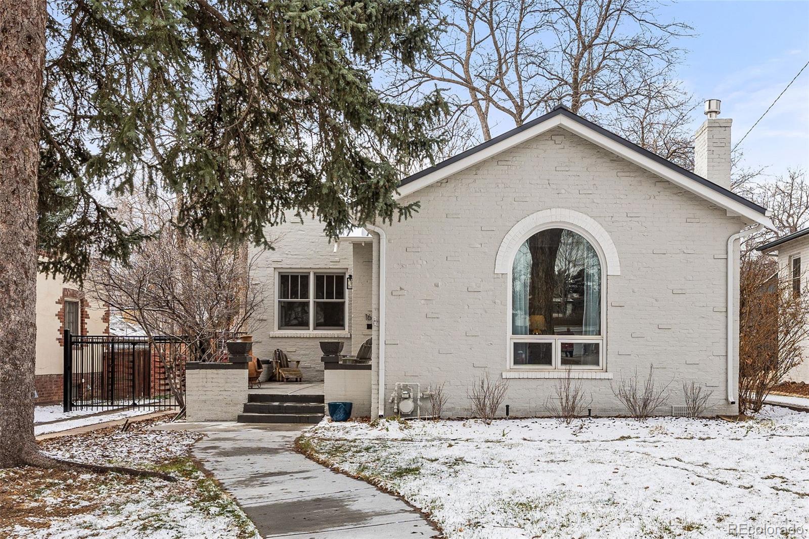 1639 Grape Street Denver, CO 80220 - Photo 2 of 39 a house view with a outdoor space