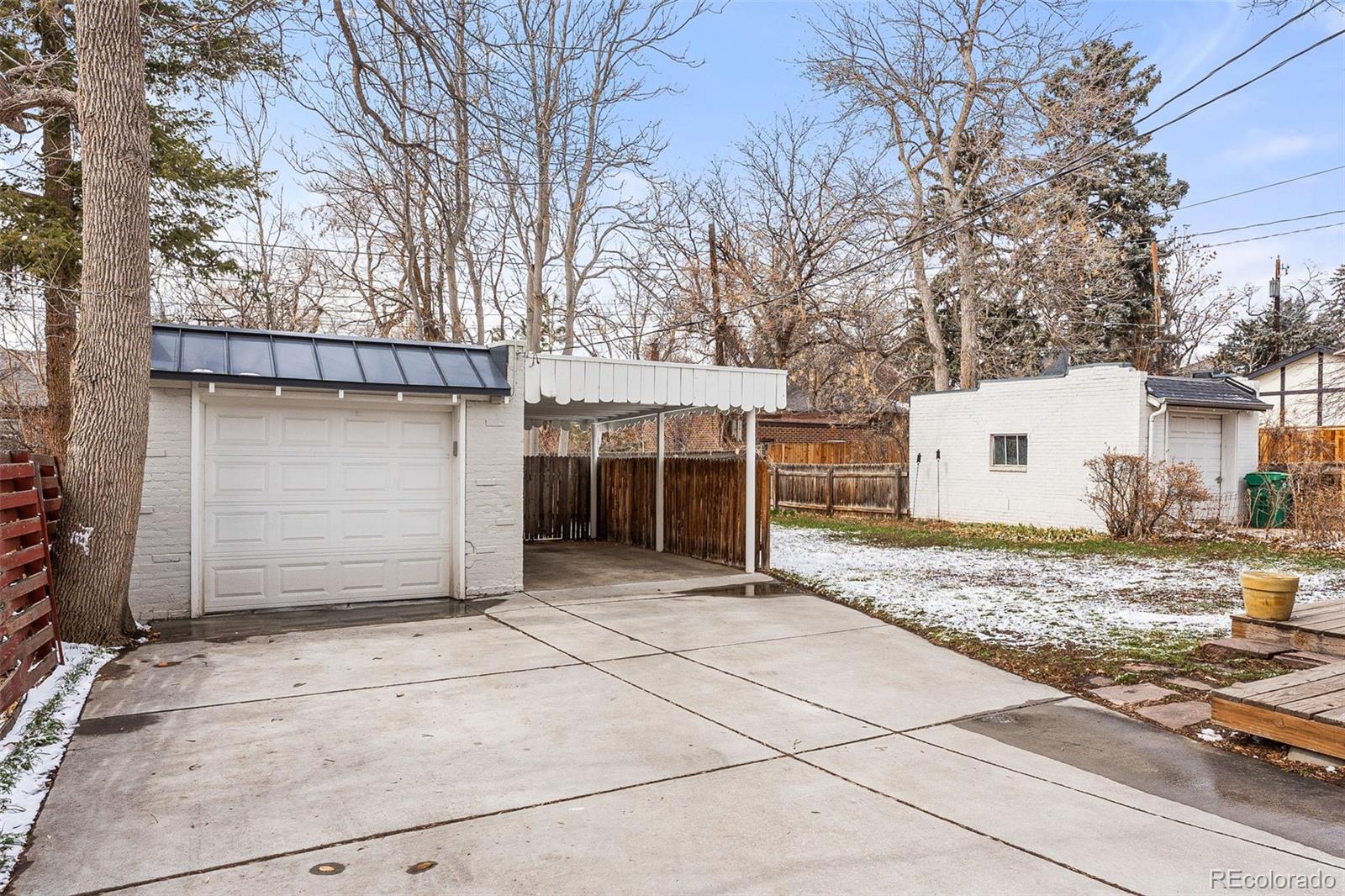 1639 Grape Street Denver, CO 80220 - Photo 31 of 39 a view of a house with a yard