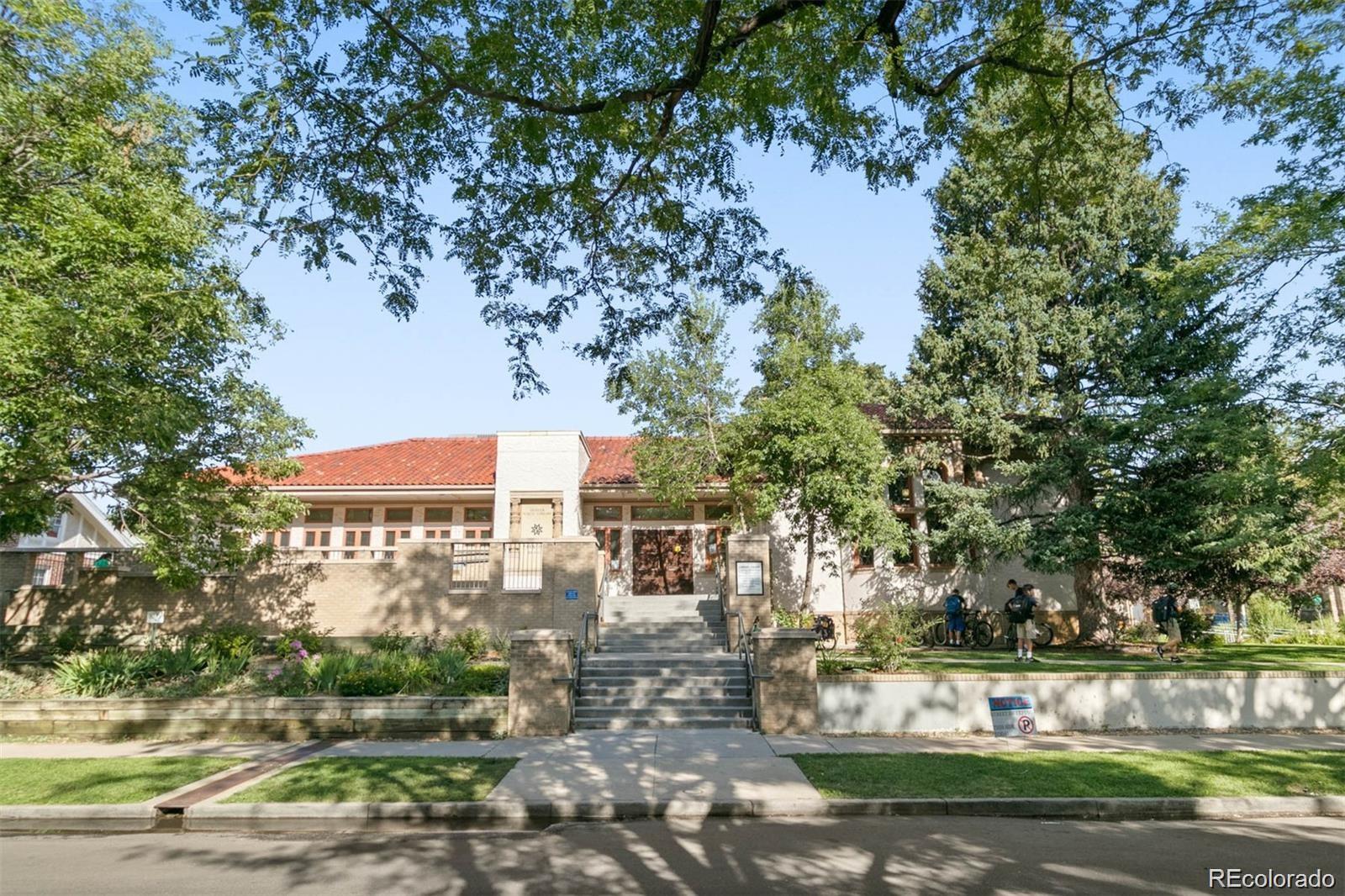 1639 Grape Street Denver, CO 80220 - Photo 36 of 39 a front view of a house with a yard