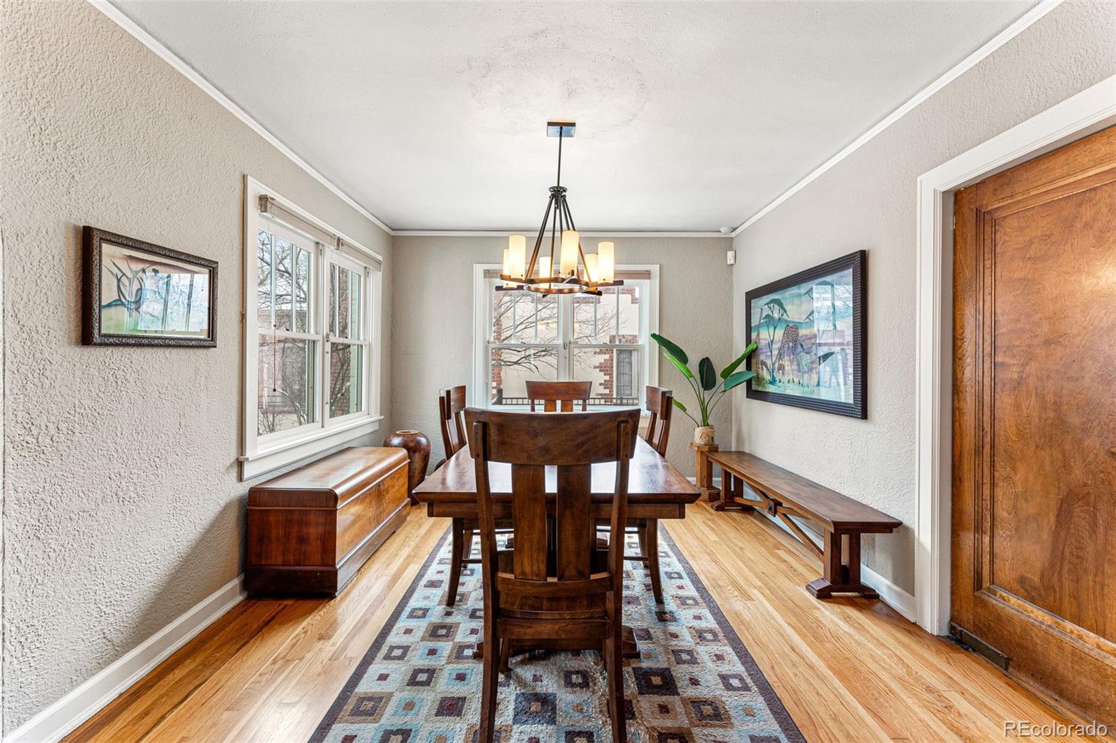 1639 Grape Street Denver, CO 80220 - Photo 10 of 39 a dining room with furniture window and wooden floor