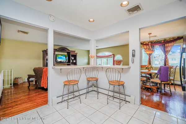 a living room with furniture and a table