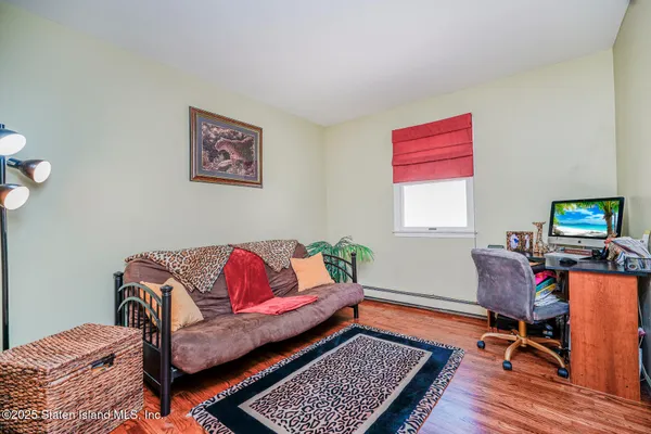 a workspace with furniture and a rug