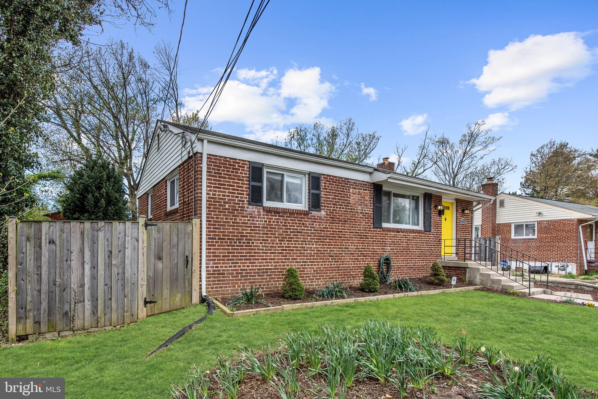 2802 Harris Avenue Silver Spring, MD 20902 - Photo 2 of 43 a backyard of a house with table and chairs