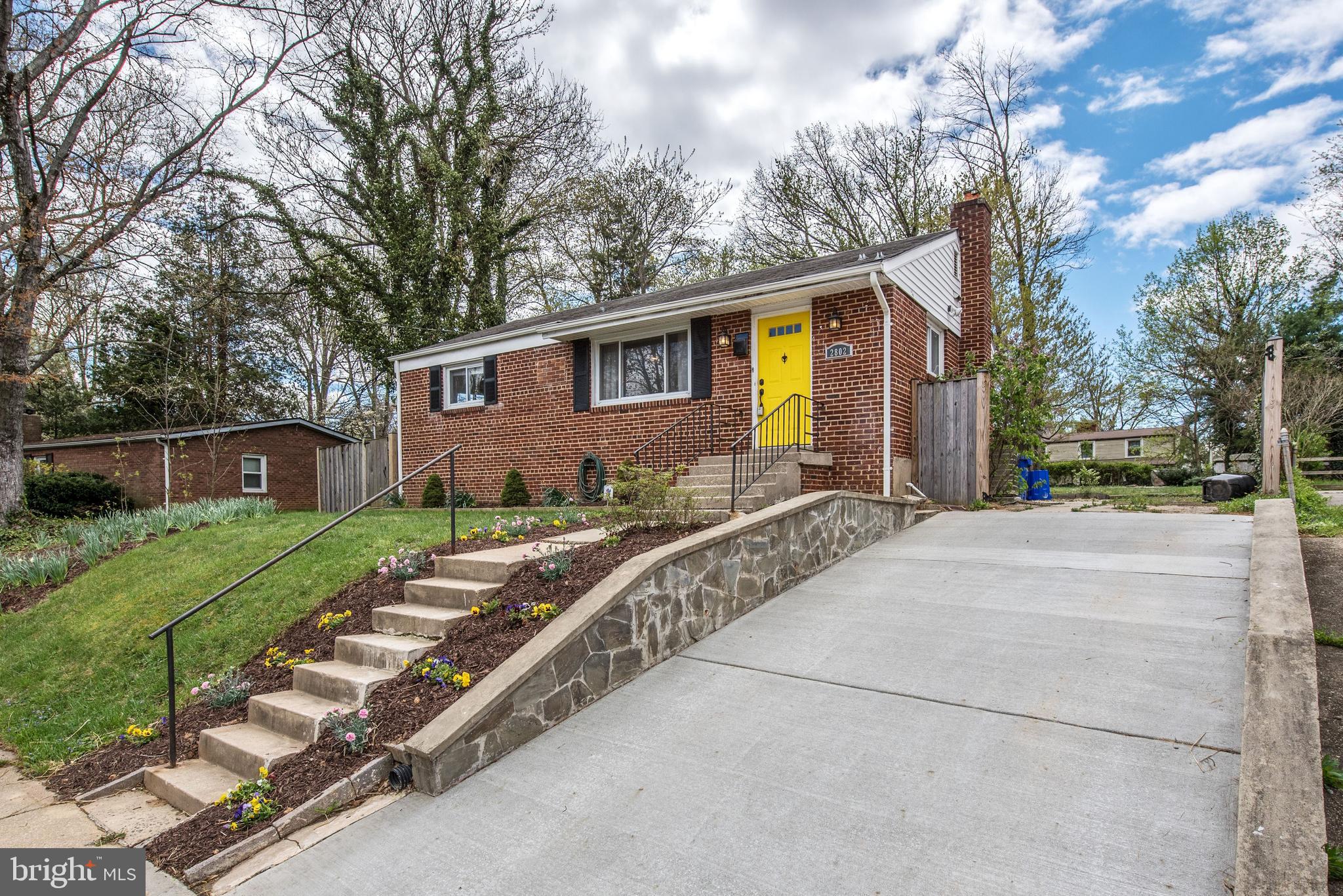 2802 Harris Avenue Silver Spring, MD 20902 - Photo 3 of 43 a front view of house with yard and trees around