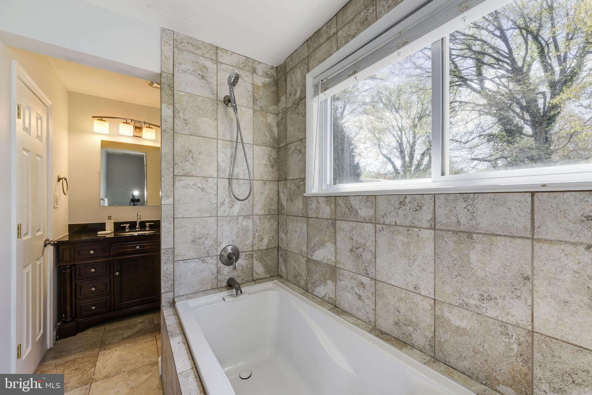 2802 Harris Avenue Silver Spring, MD 20902 - Photo 21 of 43 a bathroom with a bathtub and a sink