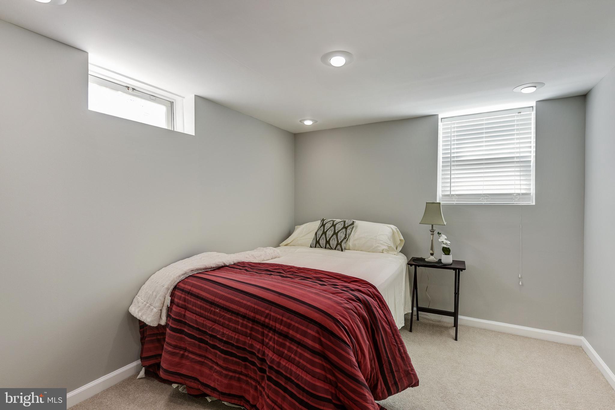 2802 Harris Avenue Silver Spring, MD 20902 - Photo 28 of 43 a bedroom with a bed and a window