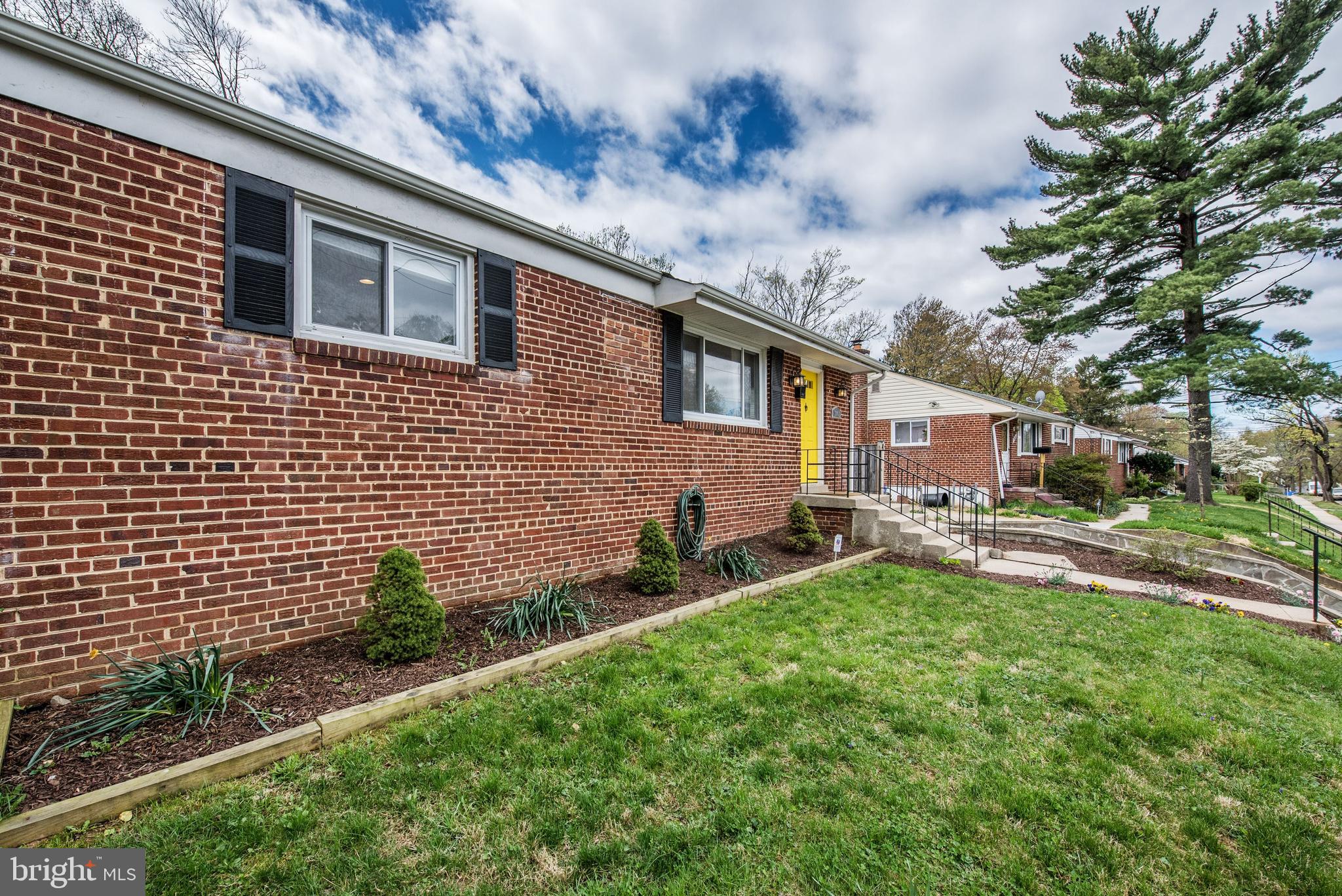 2802 Harris Avenue Silver Spring, MD 20902 - Photo 4 of 43 a backyard of a house with seating space