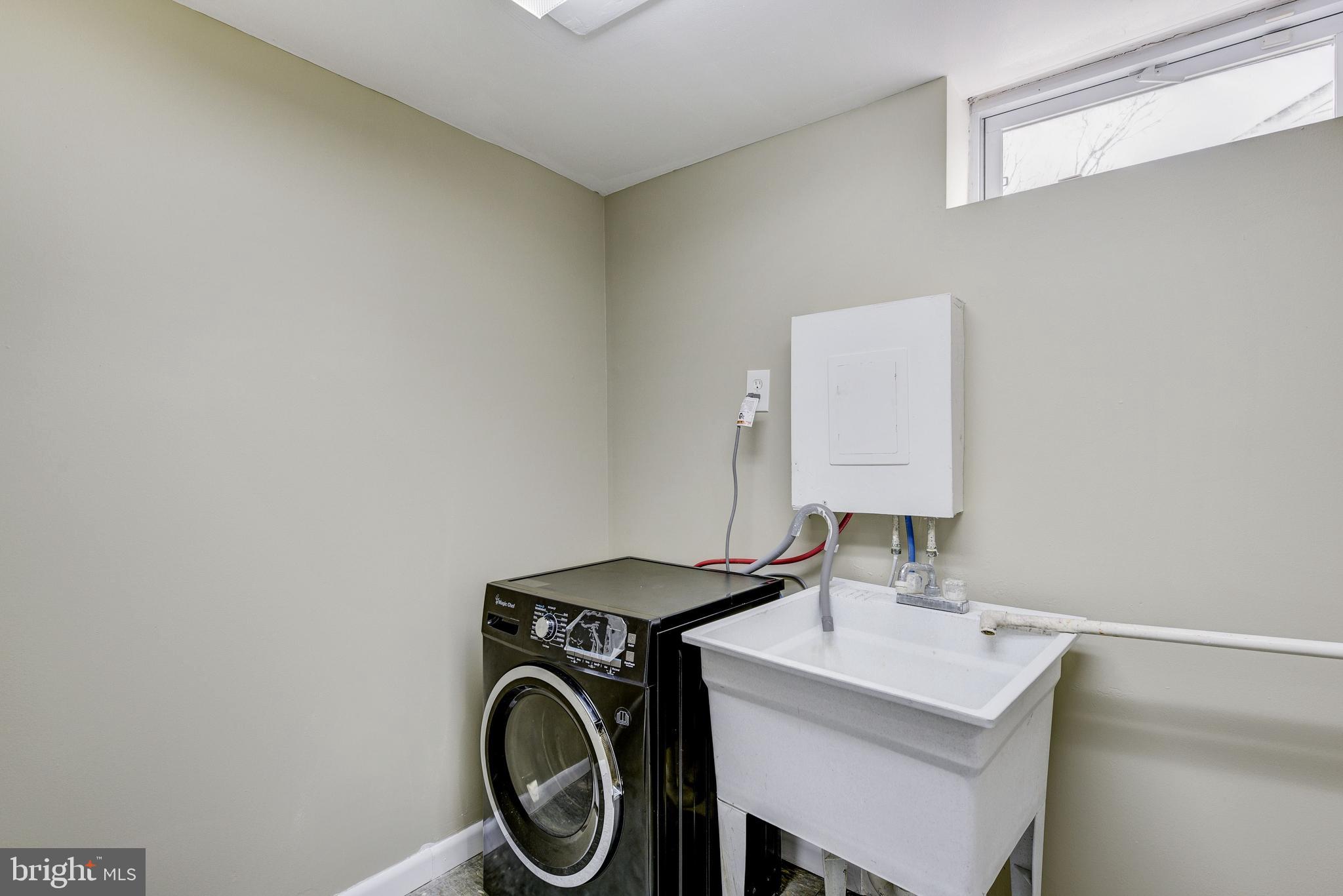 2802 Harris Avenue Silver Spring, MD 20902 - Photo 32 of 43 a utility room with dryer and washer