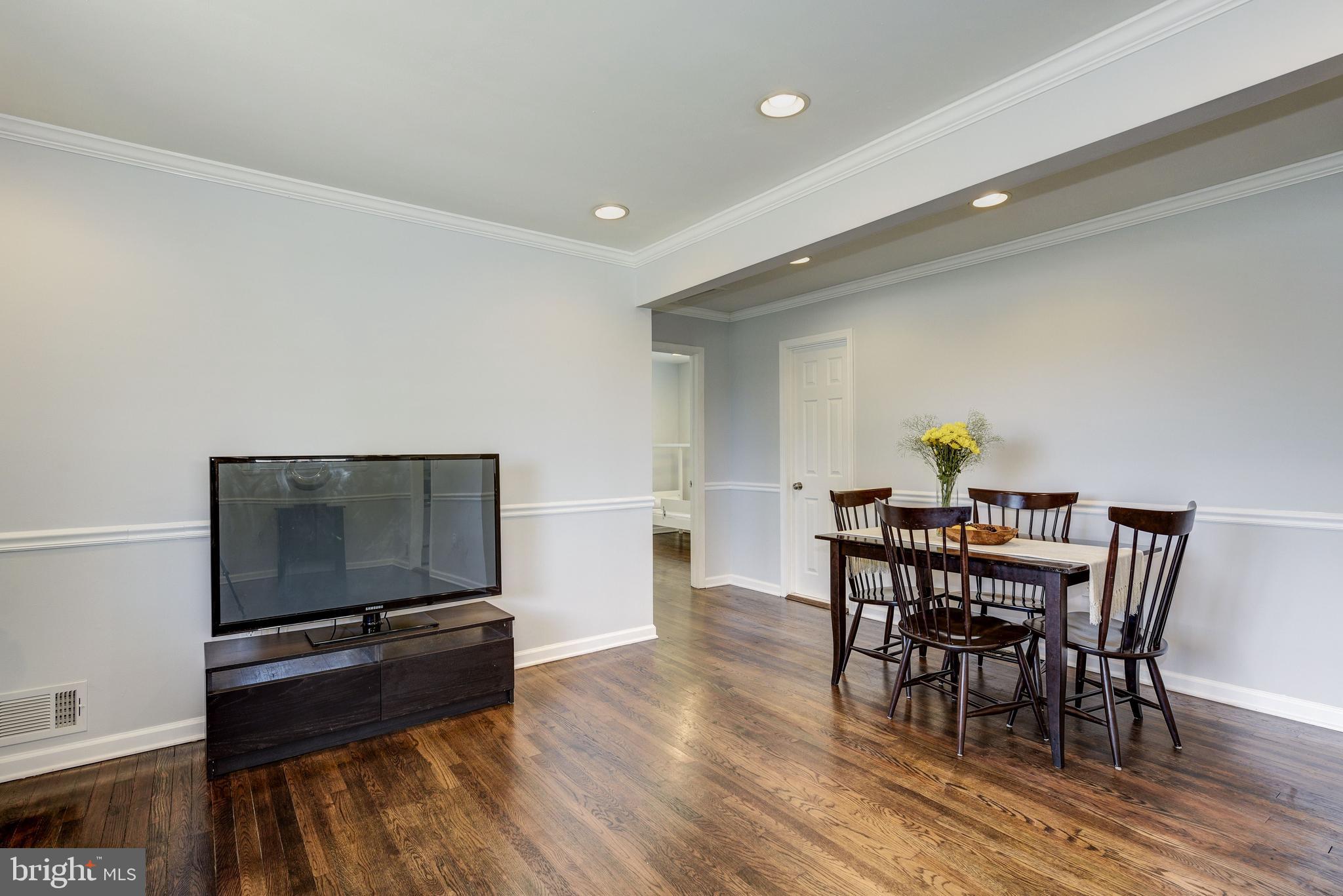 2802 Harris Avenue Silver Spring, MD 20902 - Photo 8 of 43 a view of a dining room with furniture and wooden floor