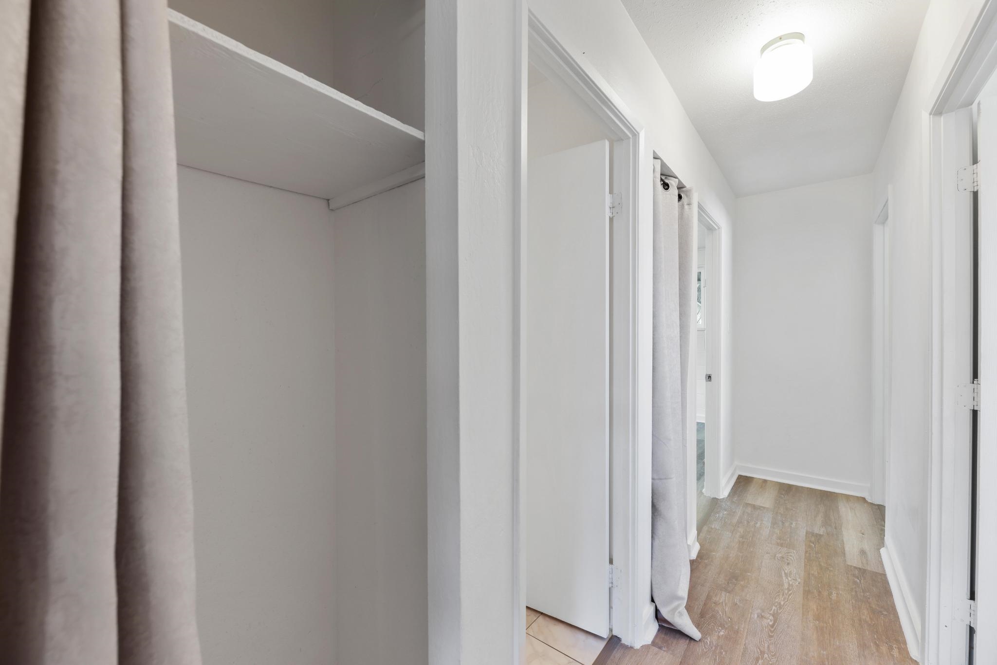 6 Kahope Place Haiku, HI 96708 - Photo 11 of 49 a view of a hallway with wooden floor