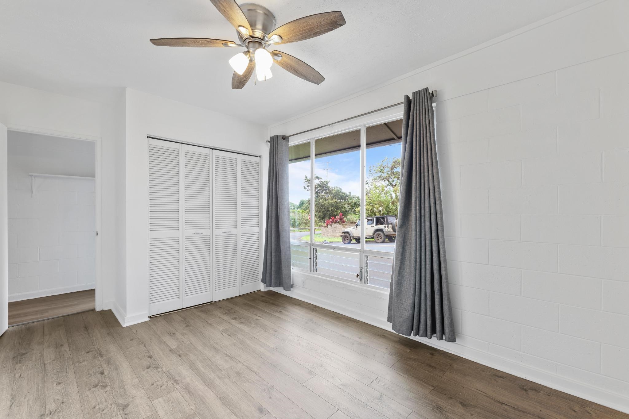 6 Kahope Place Haiku, HI 96708 - Photo 25 of 49 a view of a room with wooden floor and natural light