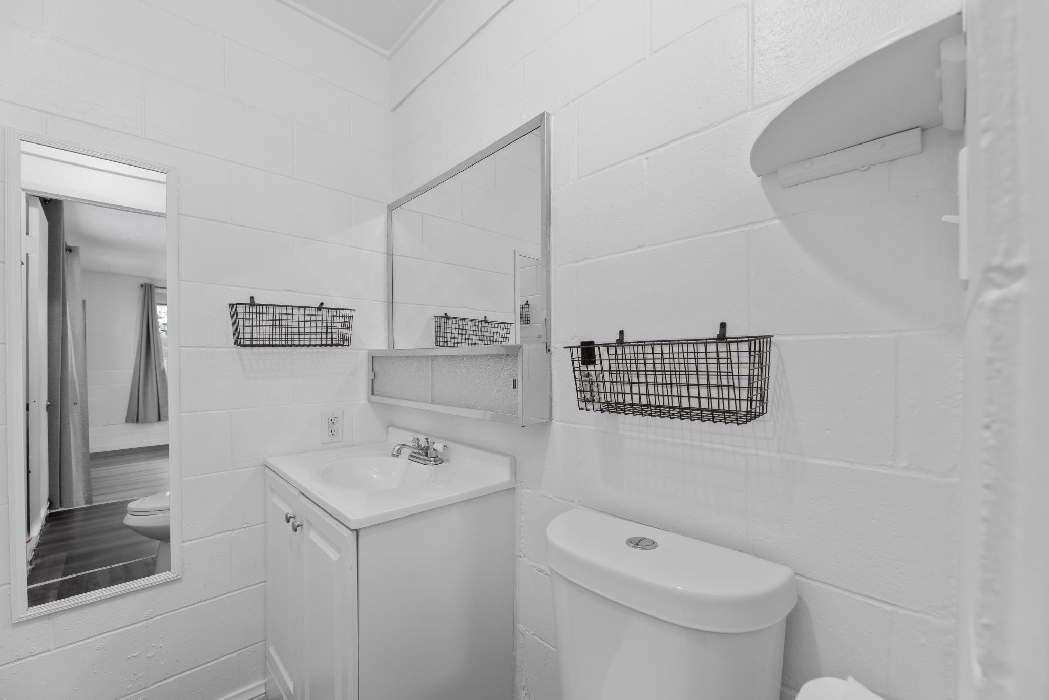 6 Kahope Place Haiku, HI 96708 - Photo 28 of 49 a bathroom with a sink a toilet and shower