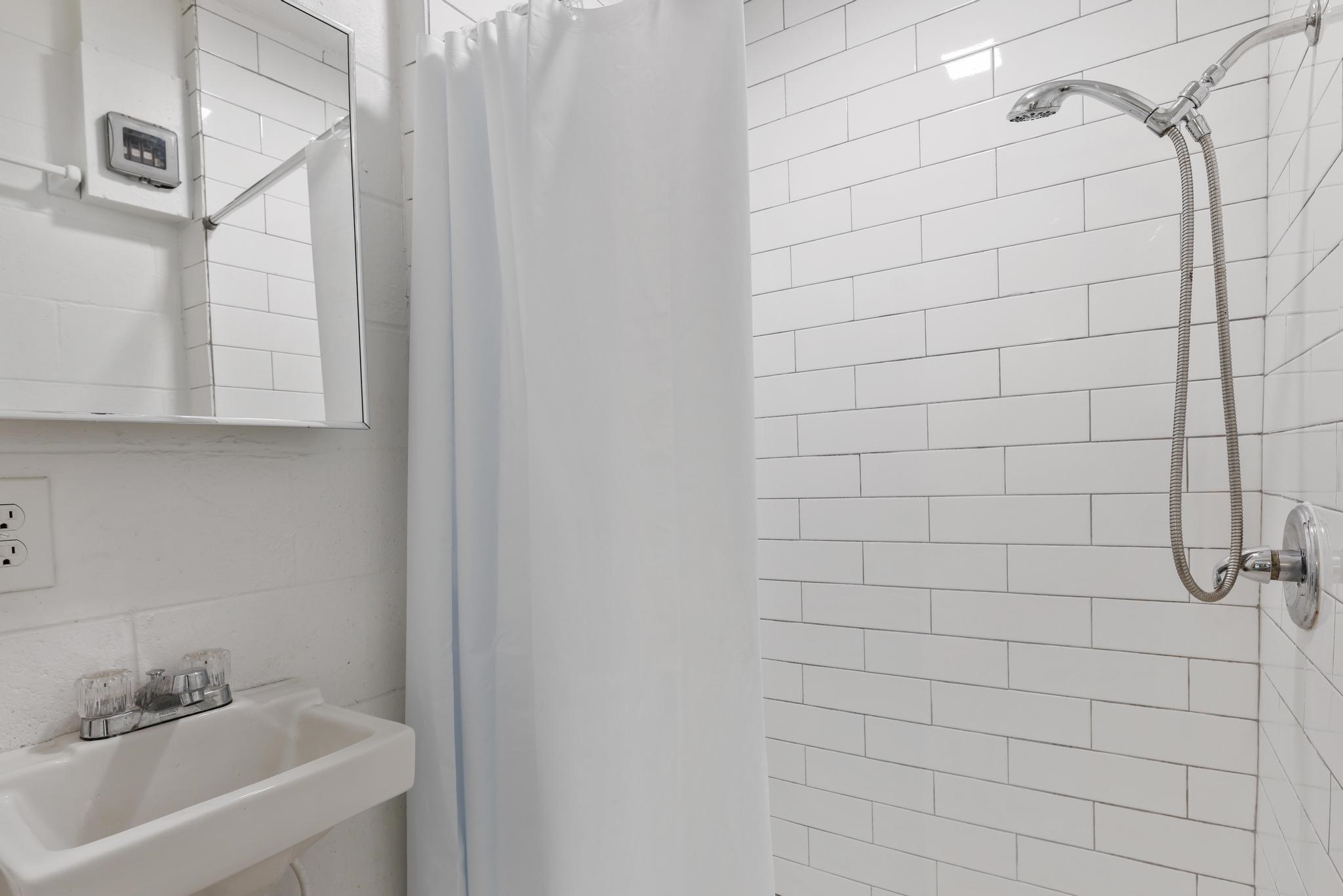 6 Kahope Place Haiku, HI 96708 - Photo 29 of 49 a bathroom with a sink and shower