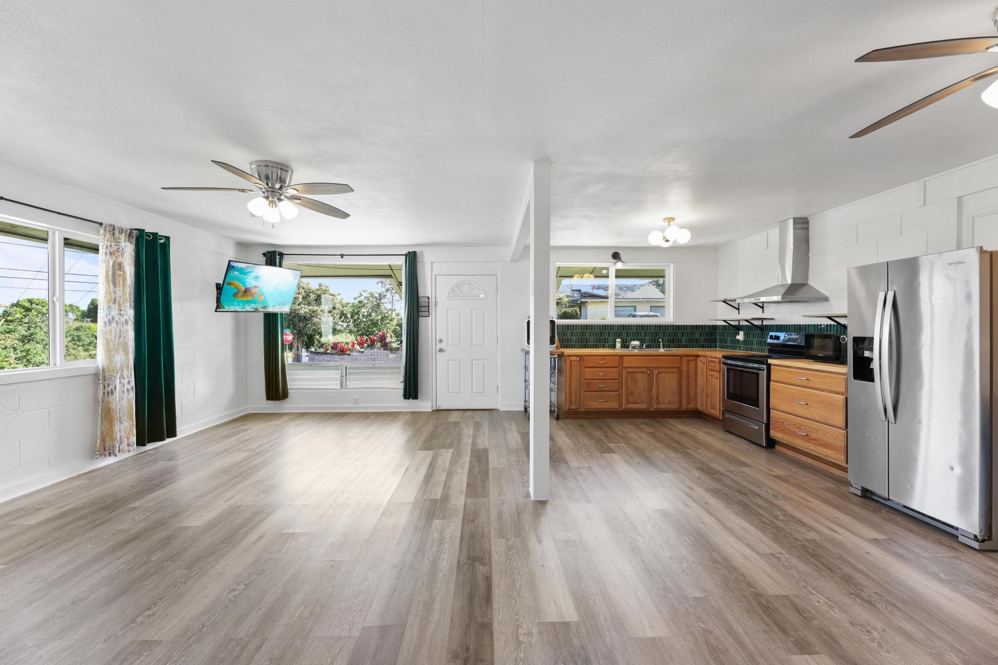 6 Kahope Place Haiku, HI 96708 - Photo 3 of 49 a view of kitchen with cabinets and wooden floor