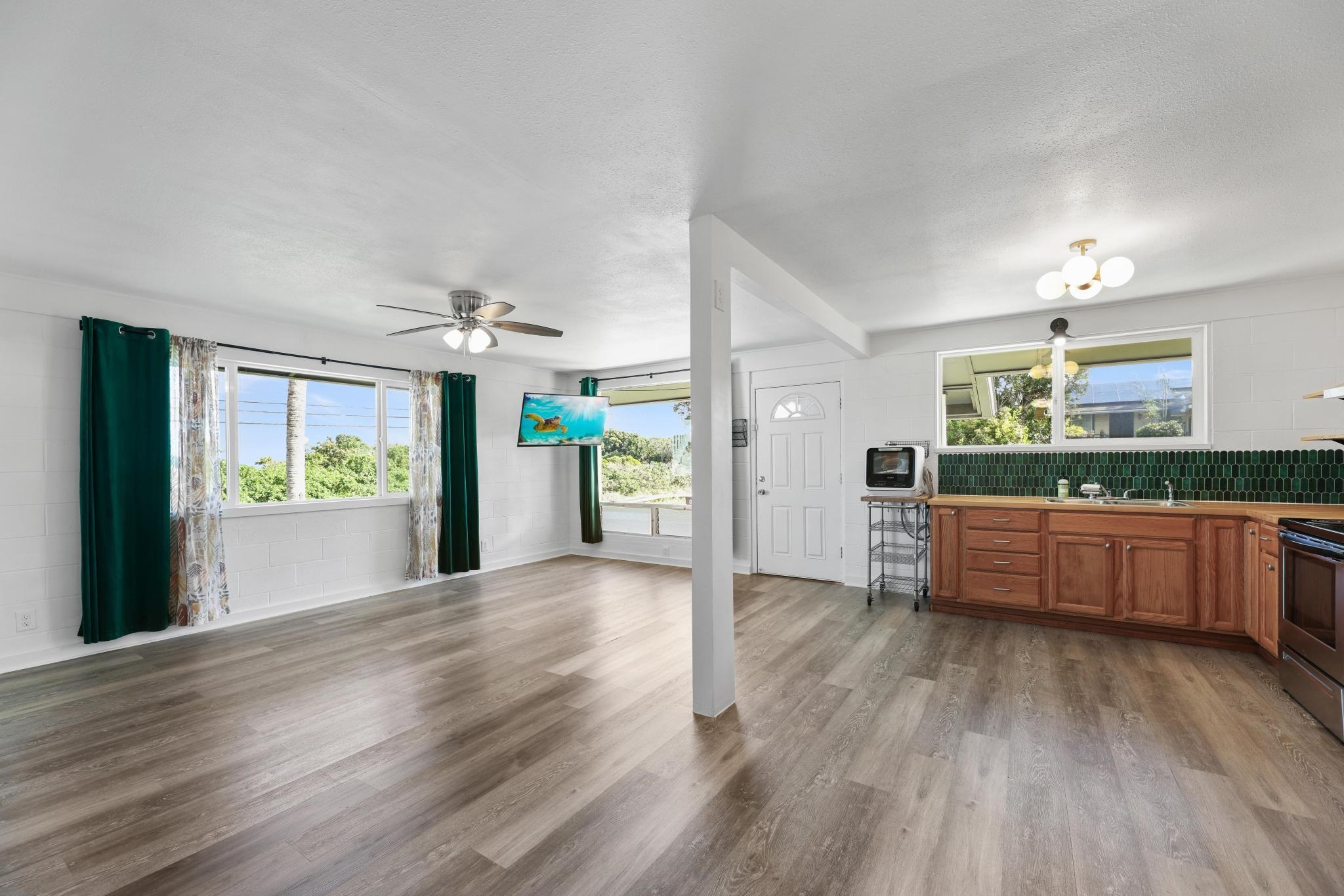6 Kahope Place Haiku, HI 96708 - Photo 5 of 49 a view of a kitchen with a sink and a large window