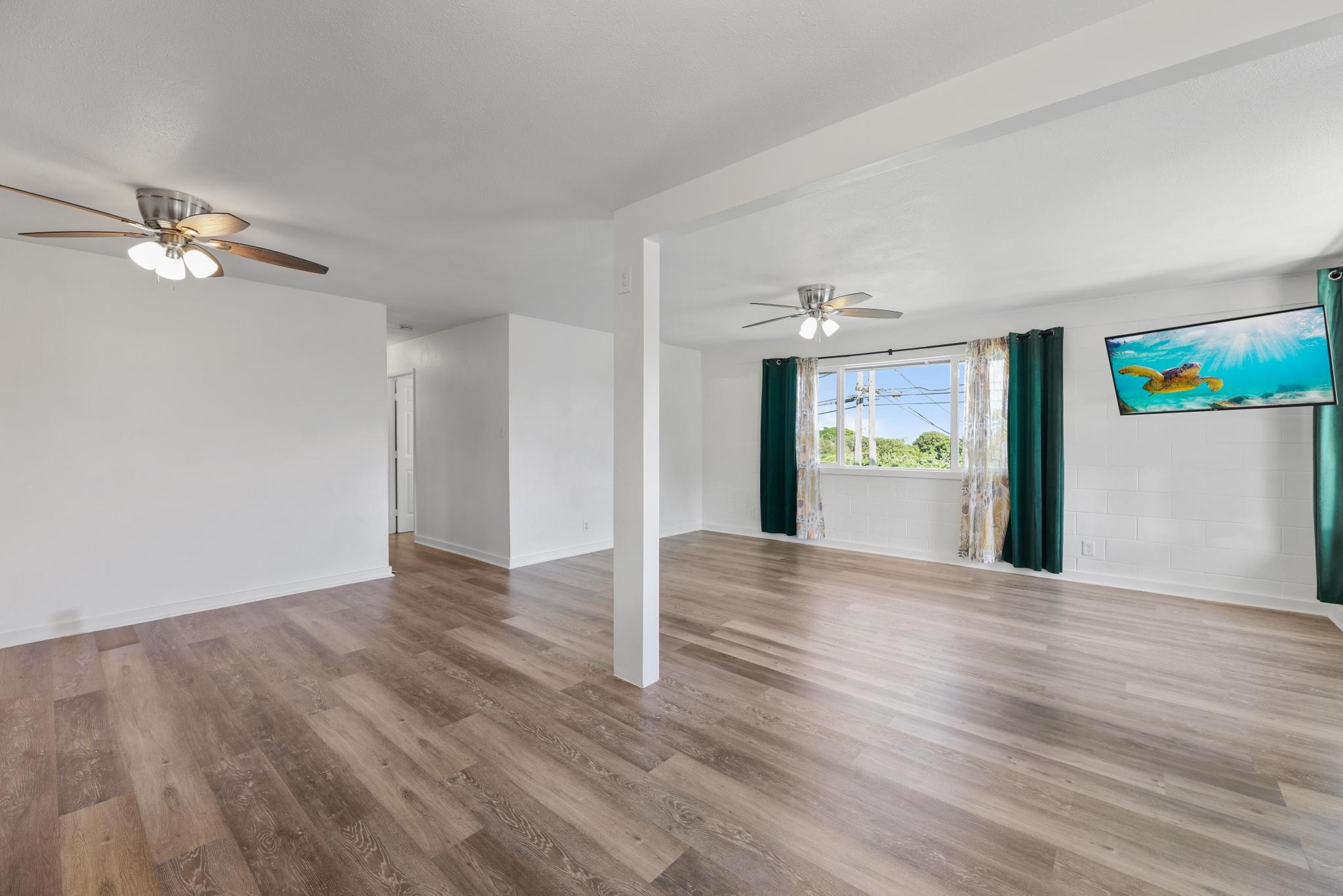 6 Kahope Place Haiku, HI 96708 - Photo 8 of 49 a view of a livingroom with a hardwood floor