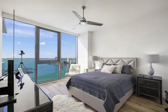 a bathroom with a sink a mirror and a toilet