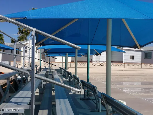 a view of a balcony with chairs