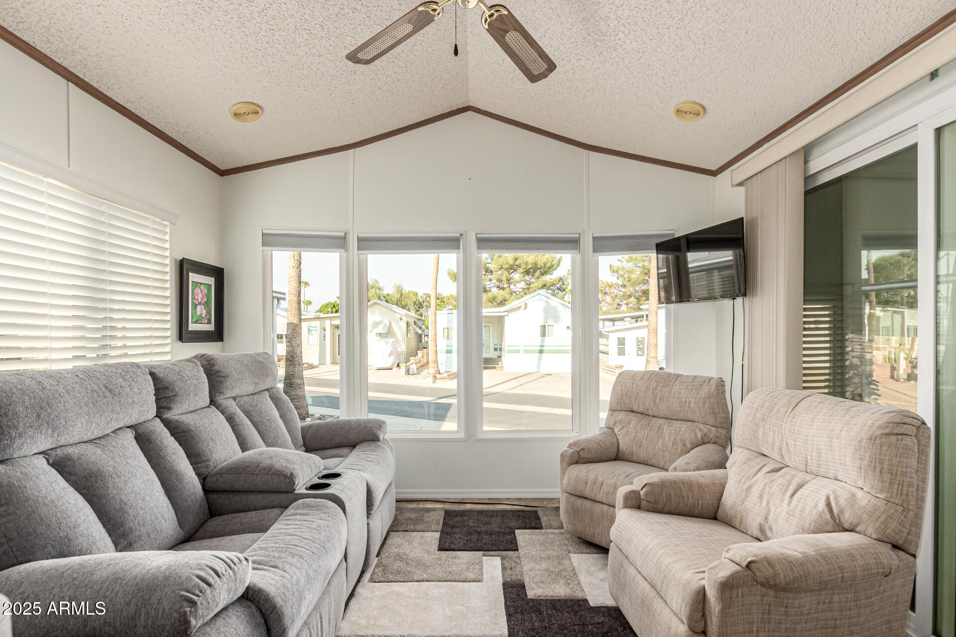 2920 South Cree Drive Apache Junction, AZ 85119 - Photo 25 of 55 a living room with furniture and a large window