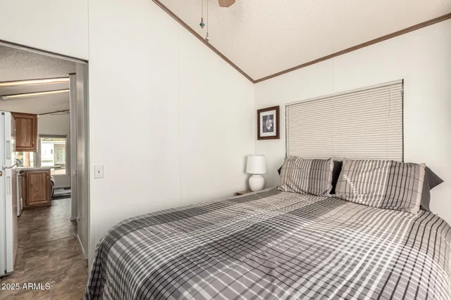 a bedroom with two beds and painted walls