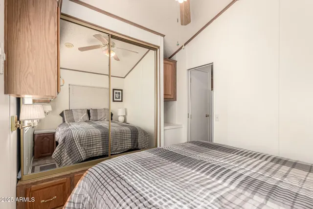 a utility room with cabinets washer and dryer